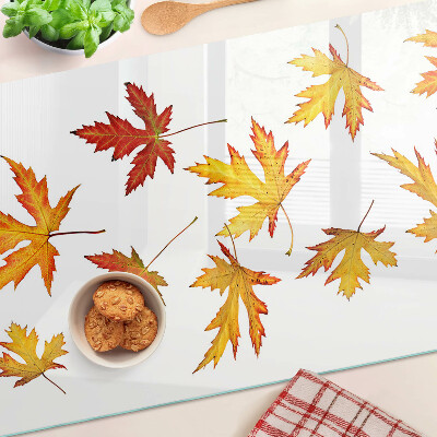 Tagliere in vetro temperato con motivo di foglie di acero nei colori autunnali