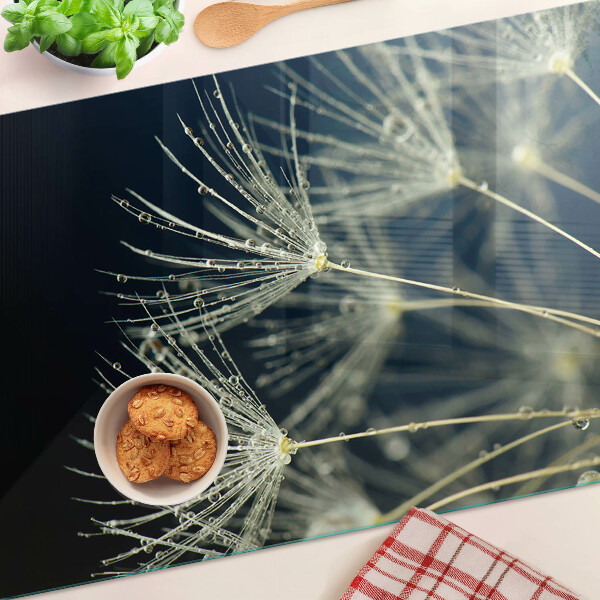 Tagliere in vetro temperato con motivo di denti di leone e gocce d'acqua