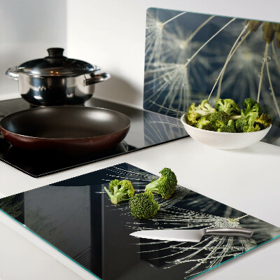 Tagliere in vetro temperato con motivo di denti di leone e gocce d'acqua