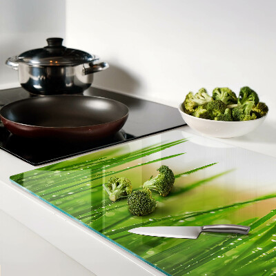 Tagliere in vetro temperato con motivo di erba e gocce d'acqua