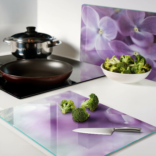 Tagliere in vetro temperato con motivo floreale nei toni del viola