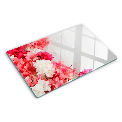 Tagliere in vetro temperato con decorazione di fiori nei toni del rosa e del bianco