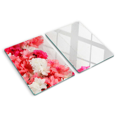 Tagliere in vetro temperato con decorazione di fiori nei toni del rosa e del bianco