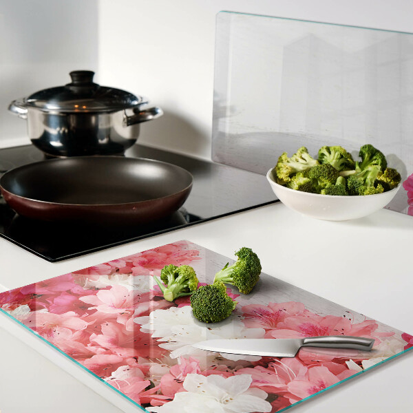 Tagliere in vetro temperato con decorazione di fiori nei toni del rosa e del bianco