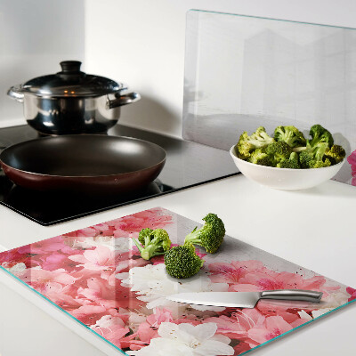 Tagliere in vetro temperato con decorazione di fiori nei toni del rosa e del bianco