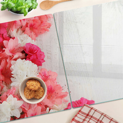 Tagliere in vetro temperato con decorazione di fiori nei toni del rosa e del bianco
