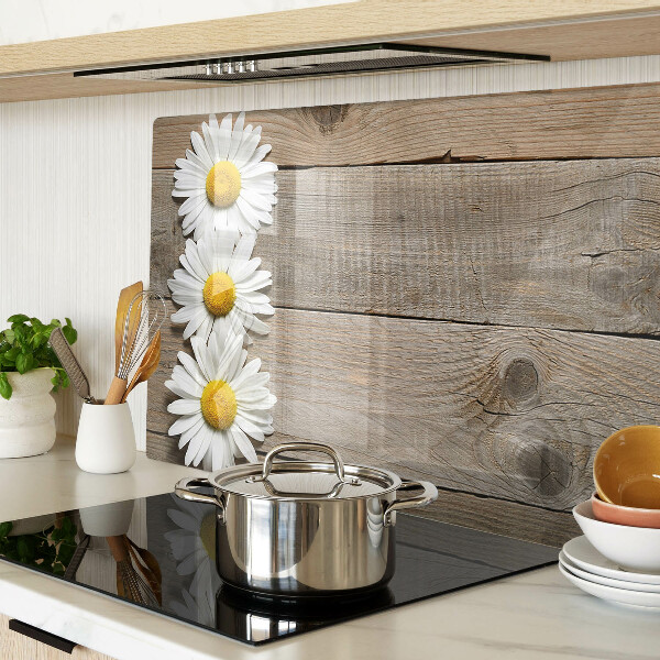 Tagliere in vetro con motivo di fiori su sfondo in legno