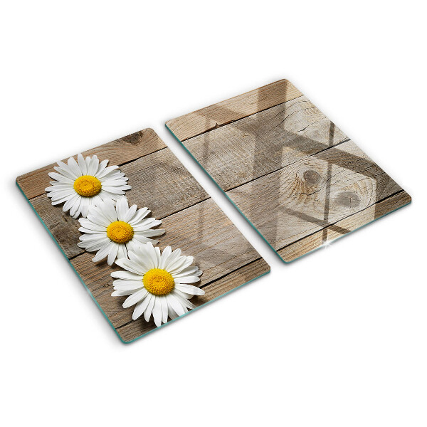 Tagliere in vetro con motivo di fiori su sfondo in legno