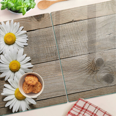 Tagliere in vetro con motivo di fiori su sfondo in legno