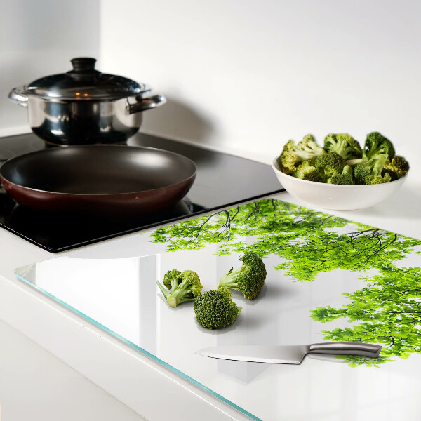 Tagliere in vetro temperato con motivo di foglie verdi su sfondo cielo