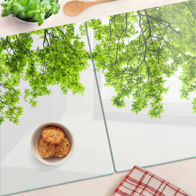 Tagliere in vetro temperato con motivo di foglie verdi su sfondo cielo