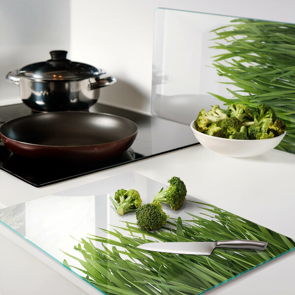 Tagliere in vetro con motivo a erba verde