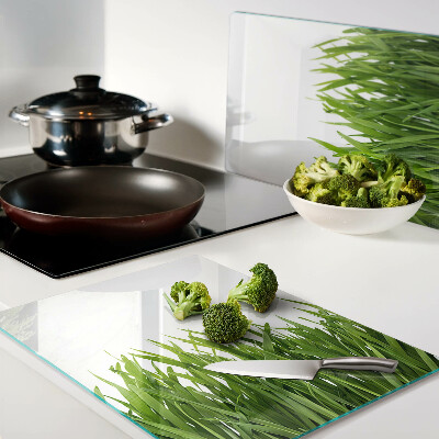 Tagliere in vetro con motivo a erba verde