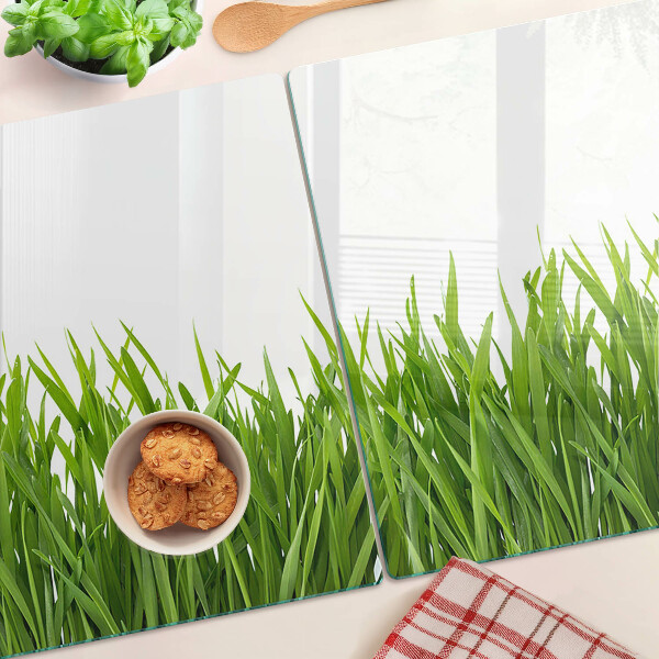 Tagliere in vetro con motivo a erba verde