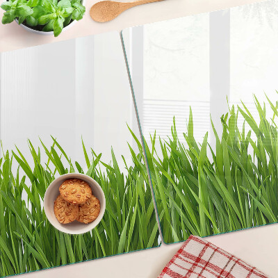 Tagliere in vetro con motivo a erba verde