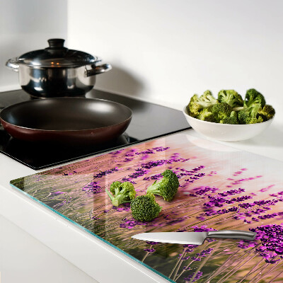 Tagliere in vetro temperato con stampa di un campo di lavanda illuminato dai raggi del sole