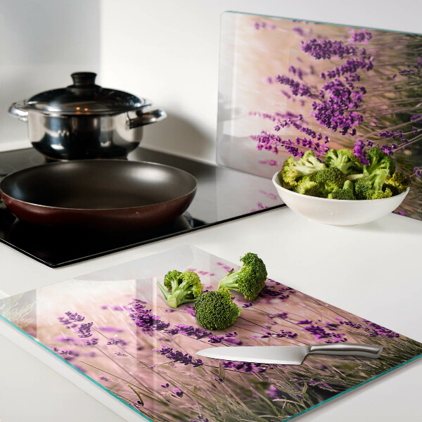 Tagliere in vetro temperato con stampa di un campo di lavanda illuminato dai raggi del sole