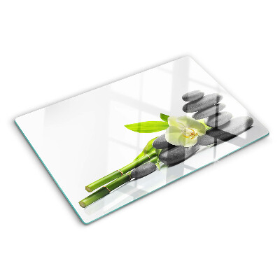 Tagliere in vetro temperato con stampa a tema orchidea e con motivo a pietre in stile spa