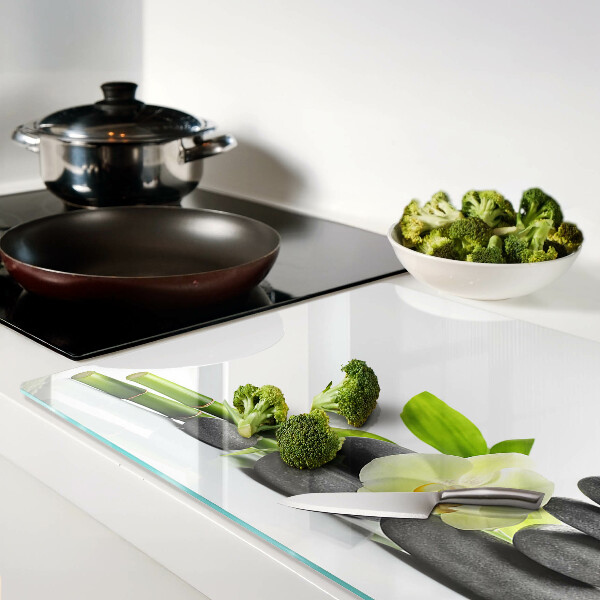 Tagliere in vetro temperato con stampa a tema orchidea e con motivo a pietre in stile spa