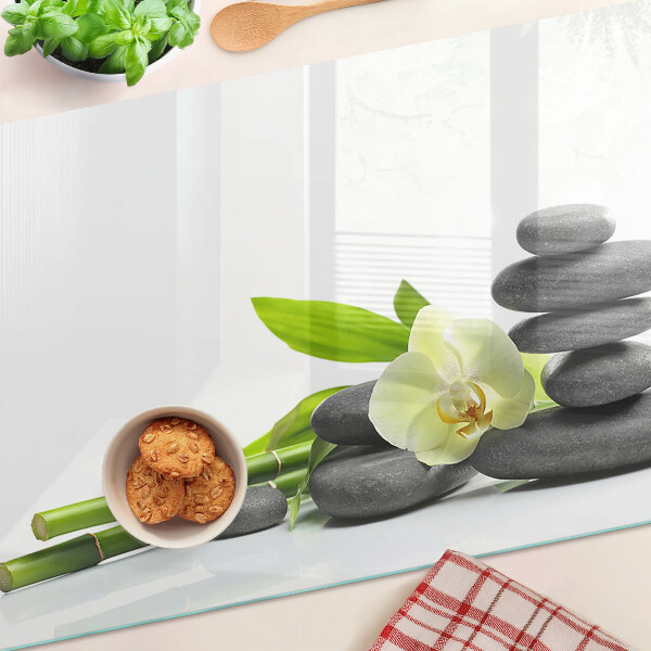 Tagliere in vetro temperato con stampa a tema orchidea e con motivo a pietre in stile spa