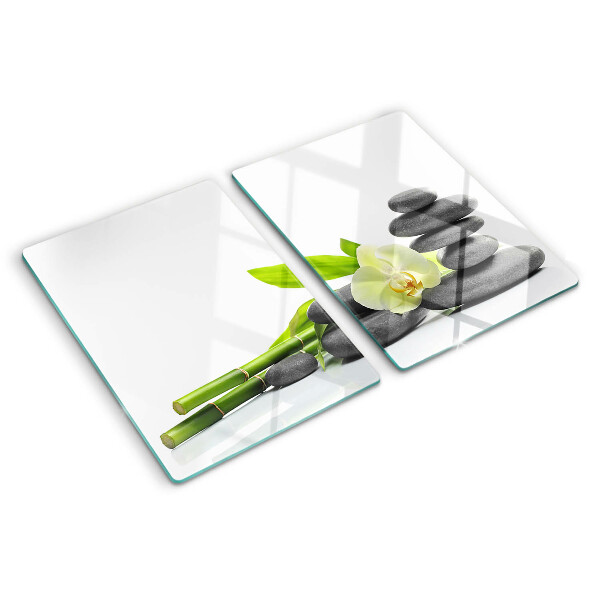 Tagliere in vetro temperato con stampa a tema orchidea e con motivo a pietre in stile spa