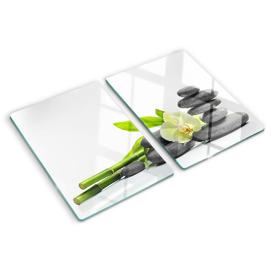 Tagliere in vetro temperato con stampa a tema orchidea e con motivo a pietre in stile spa