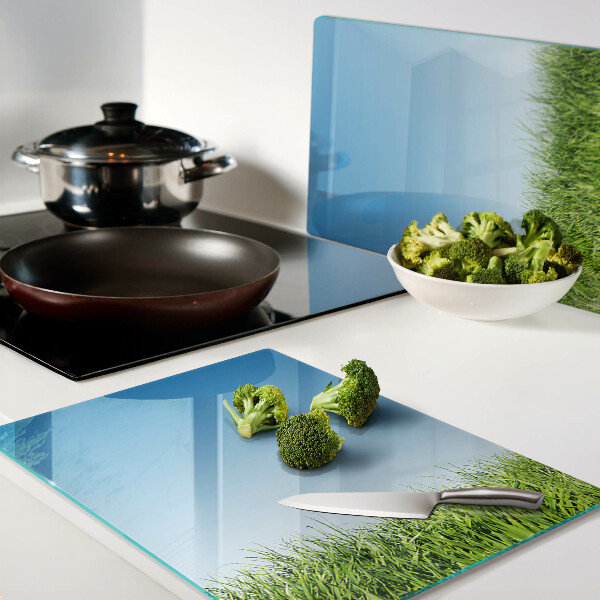 Tagliere in vetro temperato con motivo «Prato verde sotto il cielo azzurro»