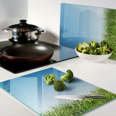 Tagliere in vetro temperato con motivo «Prato verde sotto il cielo azzurro»