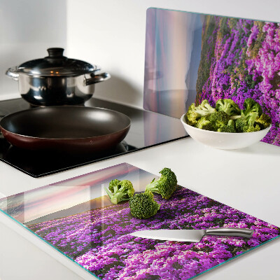 Tagliere in vetro temperato con motivo paesaggio floreale al tramonto