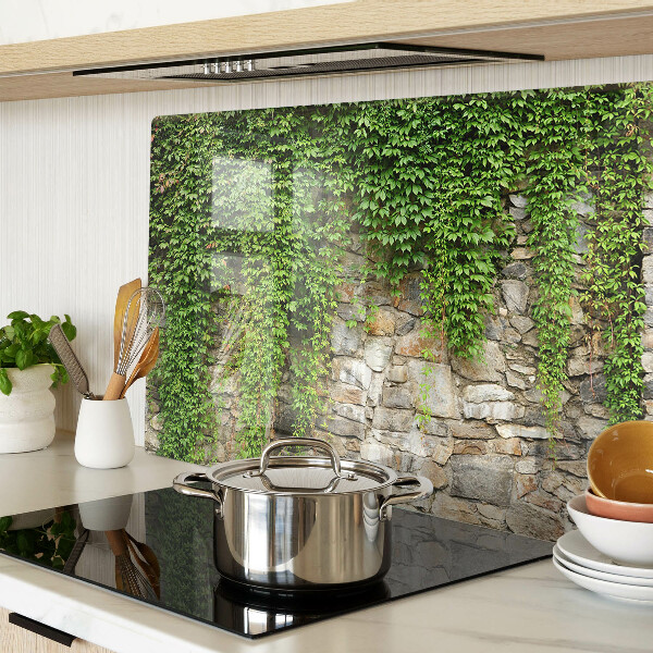 Tagliere in vetro con stampa di muro verde con muschio