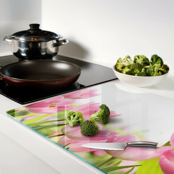 Tagliere in vetro temperato con decorazione a tulipani rosa che richiamano un giardino
