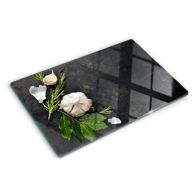 Tagliere in vetro temperato con motivo di fiori ed erbe su sfondo marmoreo