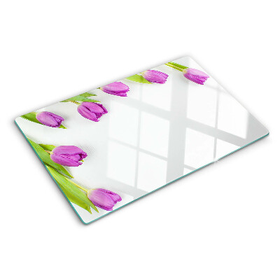 Tagliere in vetro con motivo di tulipani su sfondo bianco