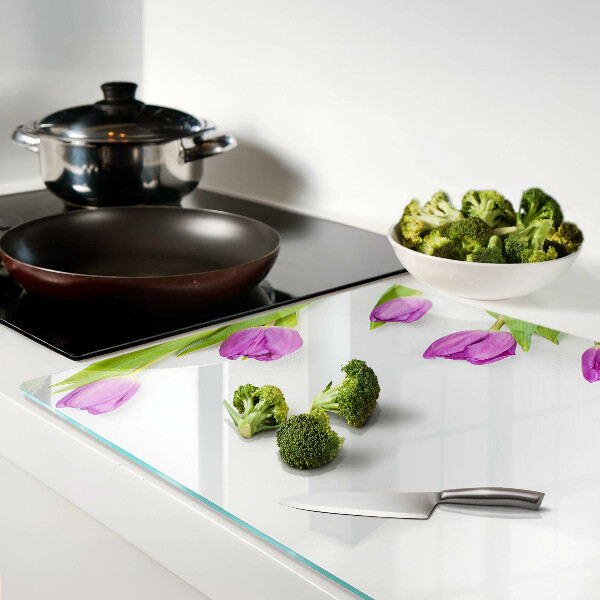 Tagliere in vetro con motivo di tulipani su sfondo bianco