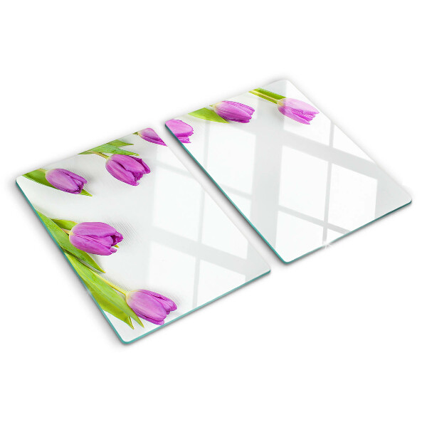 Tagliere in vetro con motivo di tulipani su sfondo bianco