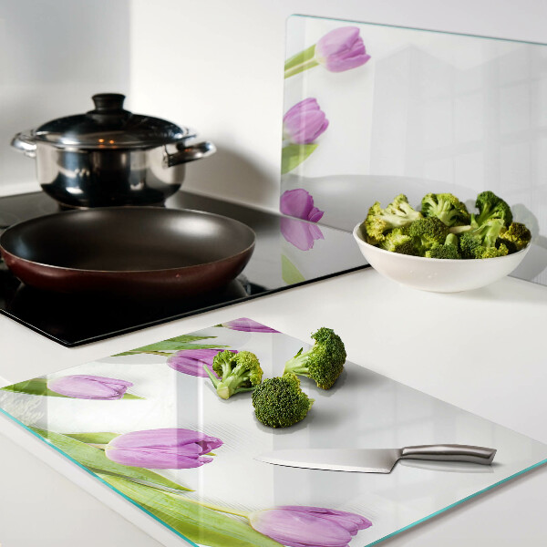 Tagliere in vetro con motivo di tulipani su sfondo bianco