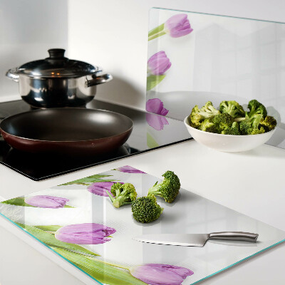 Tagliere in vetro con motivo di tulipani su sfondo bianco