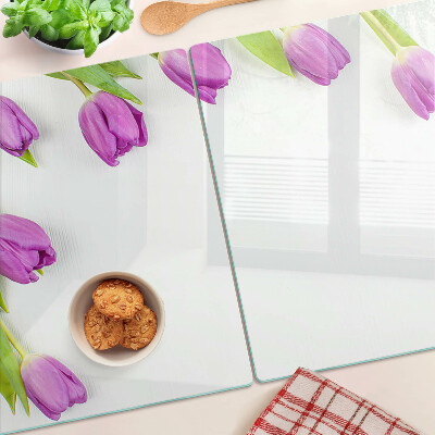 Tagliere in vetro con motivo di tulipani su sfondo bianco