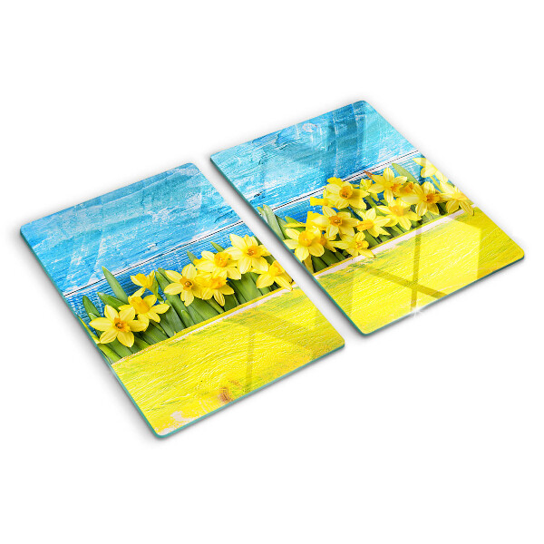 Tagliere in vetro temperato con motivo di fiori di narciso su sfondo cielo