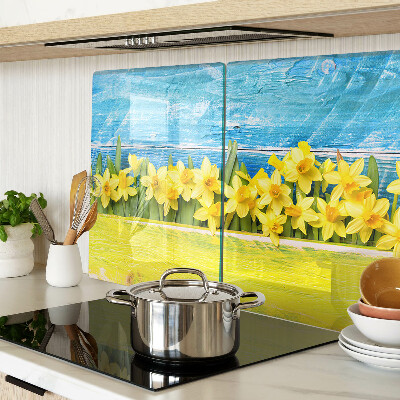 Tagliere in vetro temperato con motivo di fiori di narciso su sfondo cielo