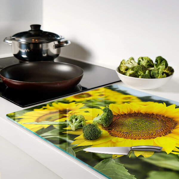 Tagliere in vetro temperato con motivo di girasoli su sfondo verde