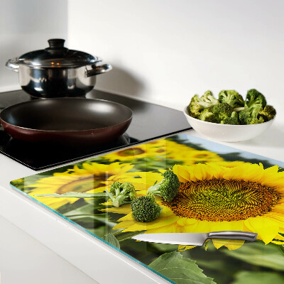 Tagliere in vetro temperato con motivo di girasoli su sfondo verde