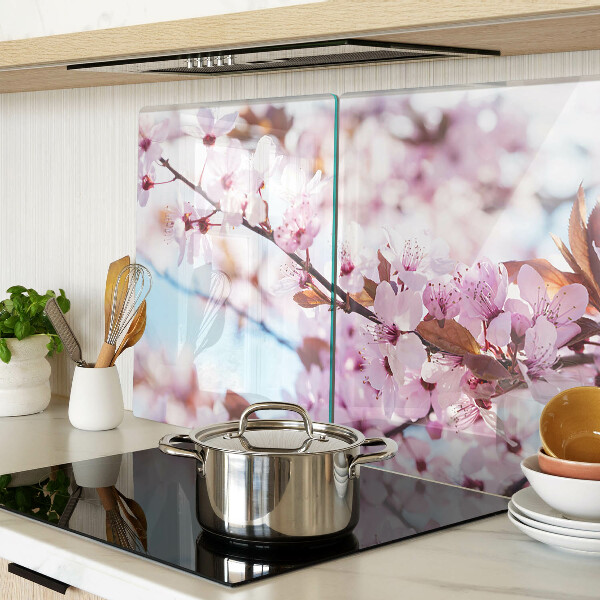 Tagliere in vetro temperato con motivo di fiori di ciliegio su sfondo blu