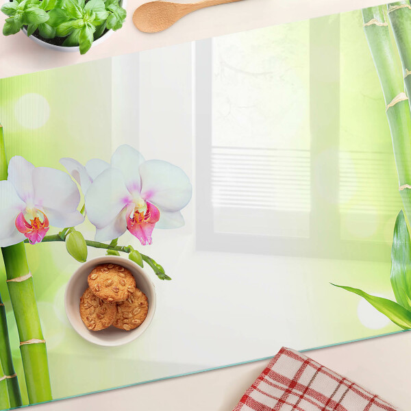 Tagliere in vetro con decorazione a orchidee e motivo in bambù