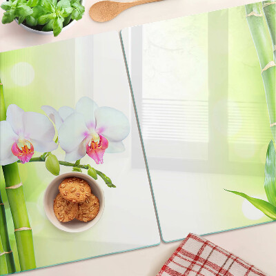 Tagliere in vetro con decorazione a orchidee e motivo in bambù