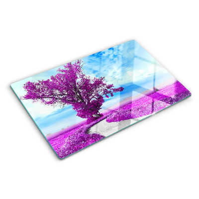 Tagliere in vetro temperato con motivo di un albero viola su sfondo di cielo