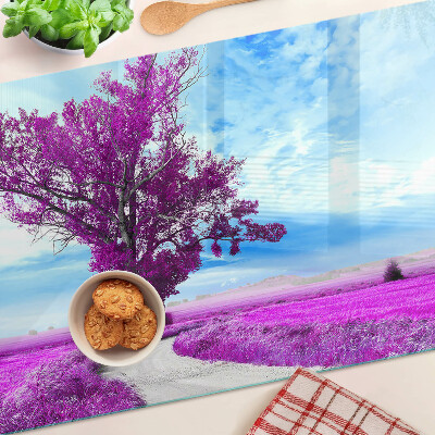 Tagliere in vetro temperato con motivo di un albero viola su sfondo di cielo