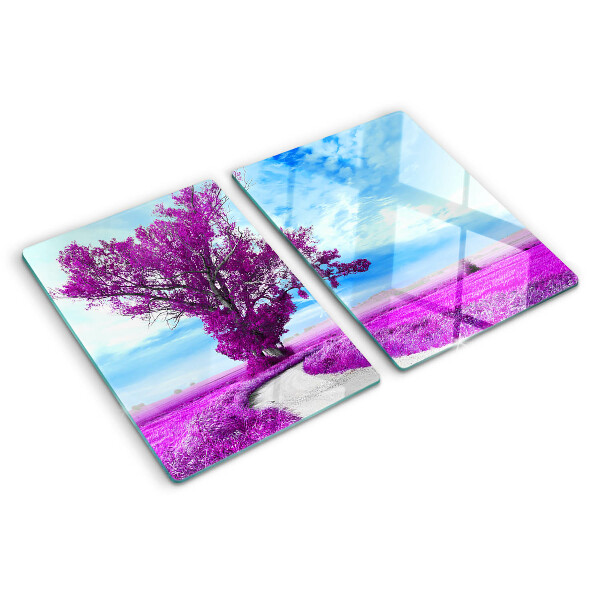Tagliere in vetro temperato con motivo di un albero viola su sfondo di cielo