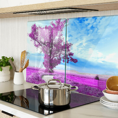 Tagliere in vetro temperato con motivo di un albero viola su sfondo di cielo