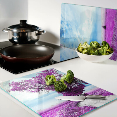 Tagliere in vetro temperato con motivo di un albero viola su sfondo di cielo